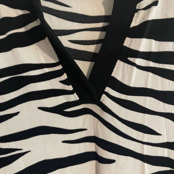 Classic Zebra-Print
Split-Neck Top - Picture 6 of 6